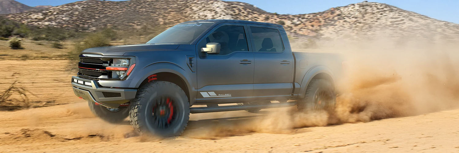 Side shot of Shelby Raptor driving off-road