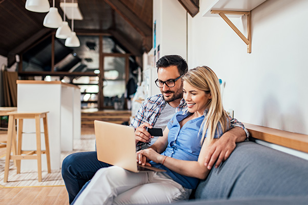 Young couple shopping for car online