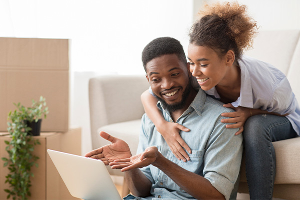 Young couple shopping for car online