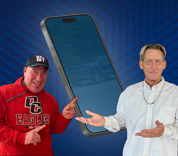 Ford employee smiling at her phone while out for coffee