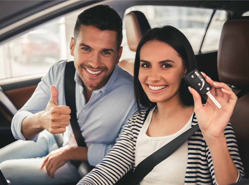 couple buying new car