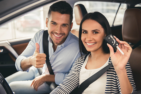 couple buying new car