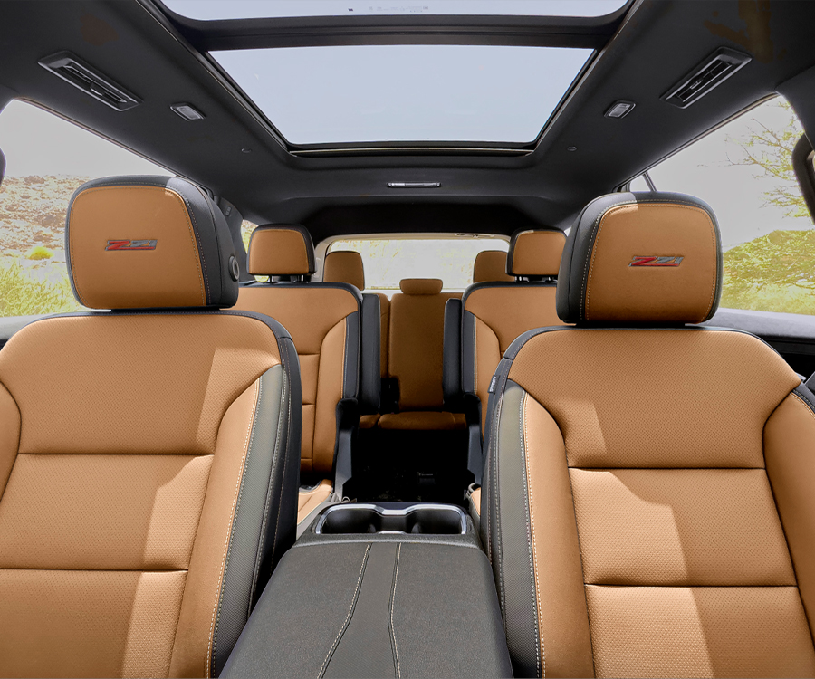 The Interior of a 2027 Chevy Traverse Featuring Premium Seating, Three Rows of Passenger Space, and a Panoramic Sunroof.