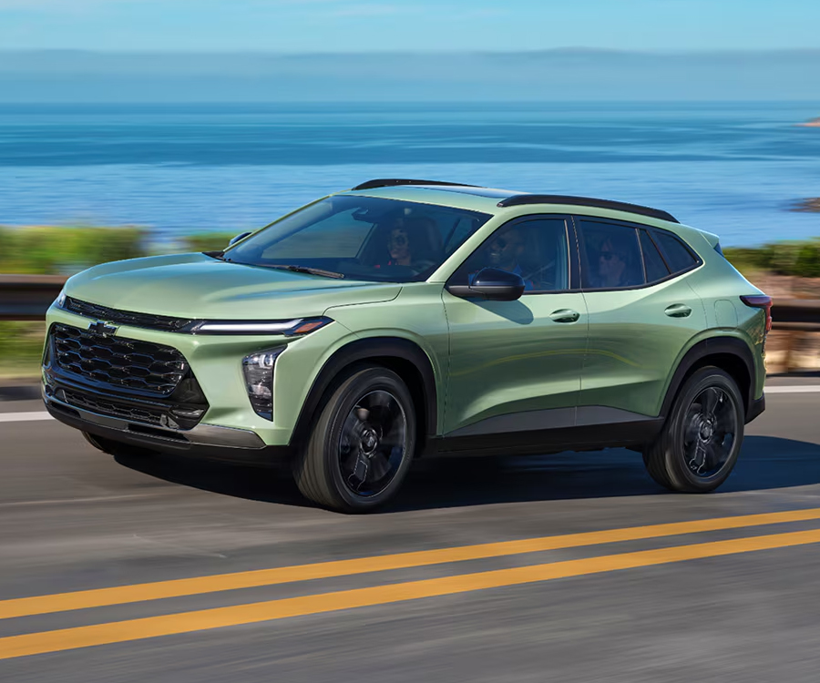 2026 Chevy Trax Speeding Over a Bridge Overlooking a Lake Below