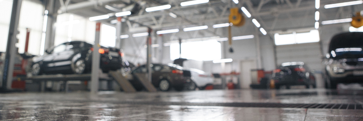 Blurred image of autobody shop main garage