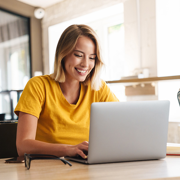 Customer smiling on computer